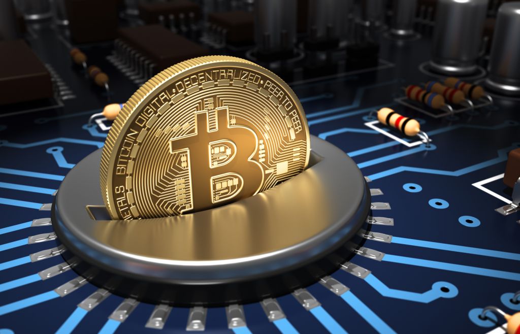 Putting Bitcoin Into Coin Slot On Blue Motherboard. 3D Illustration.
